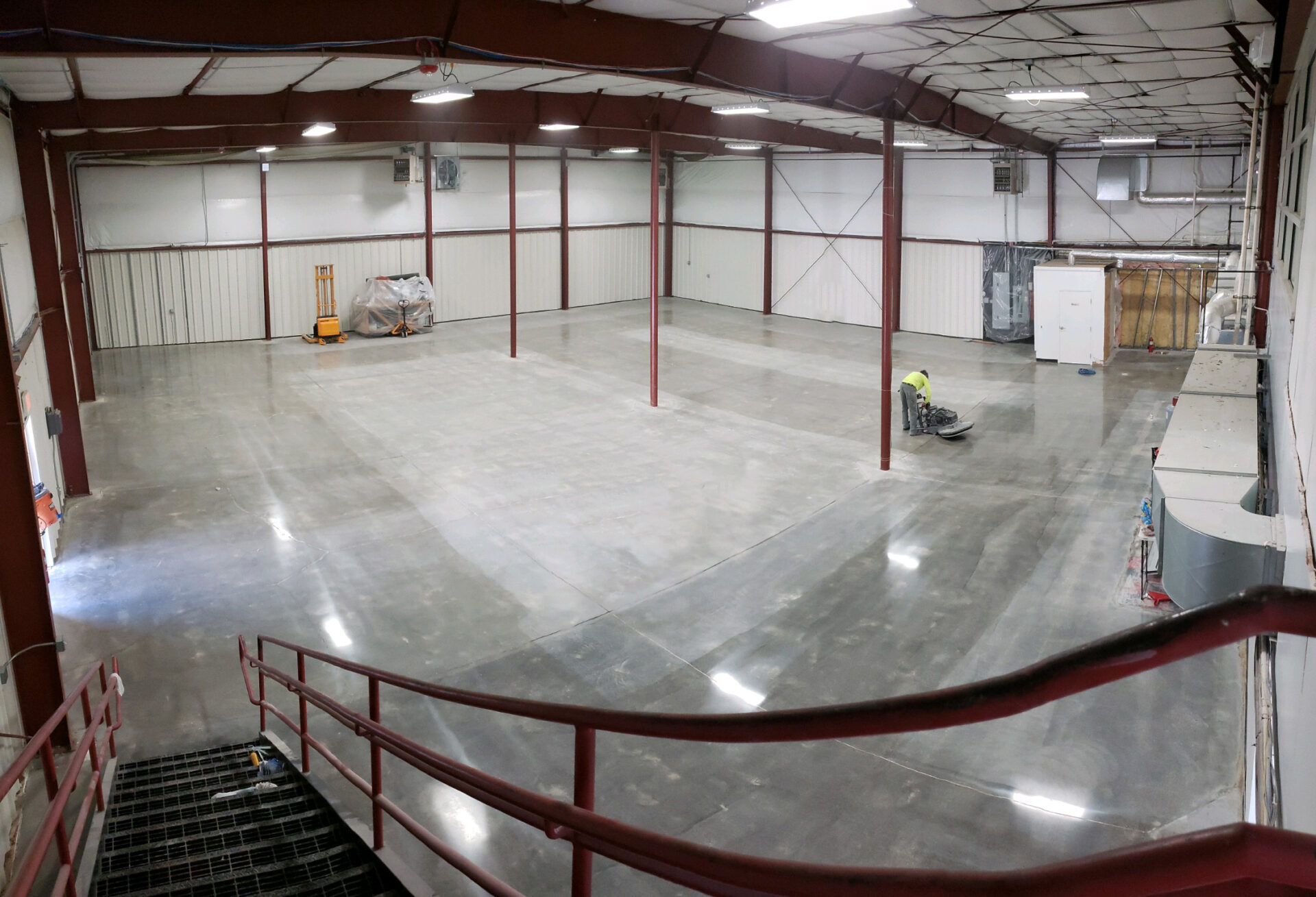 Storage units in Manchester, VT. The entire slab was ground, honed, densified, and polished to 400 grit finish. The owner asked for the aisles to be shiny and more reflective. The aisles between the individual storage units were guarded and burnished to 800 grit