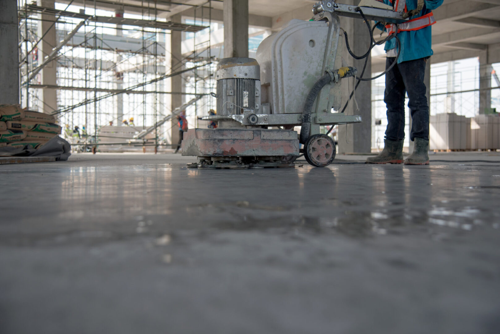 Construction,Worker,Produces,The,Grout,And,Finish,Wet,Concrete,With