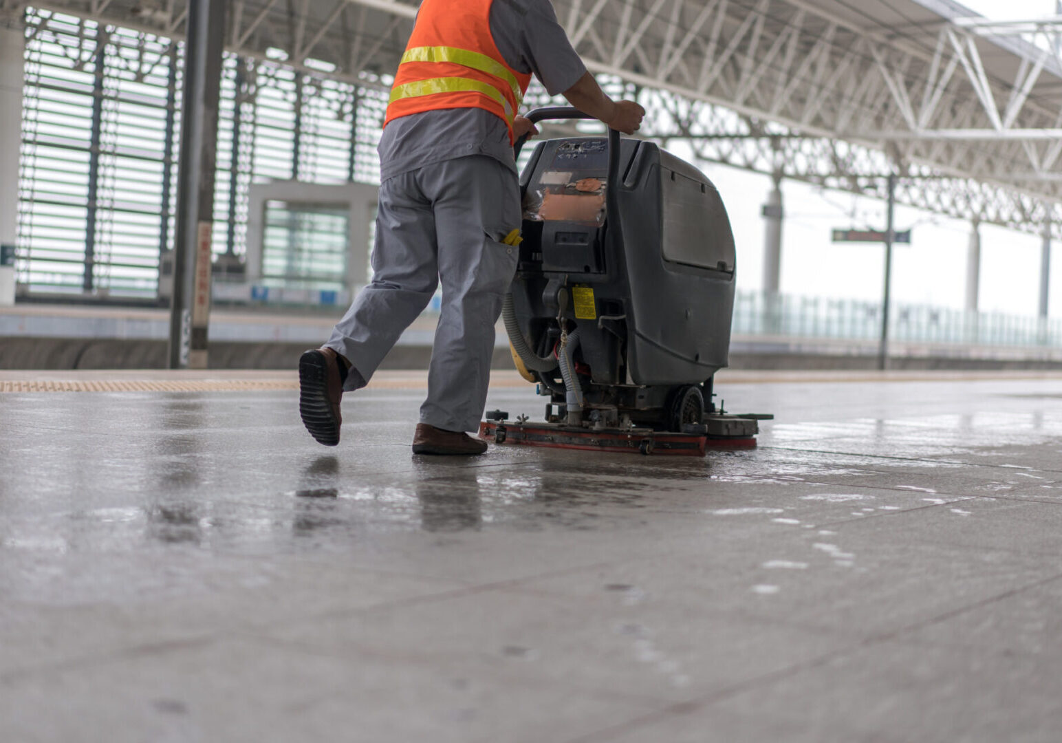 Worker,Cleaning,Floor,With,Machine